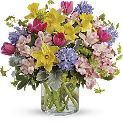 Celebrate the joy of the new season with this springtastic bouquet! Fresh and colorful in spring's favorite pastel hues, this mix of tulips, hyacinths and daffodils brings spring in!
Hot pink tulips, light pink alstroemeria, yellow daffodils and lavender hyacinth are mixed with bupleurum, dusty miller and pittosporum.
Delivered in a clear cylinder vase.