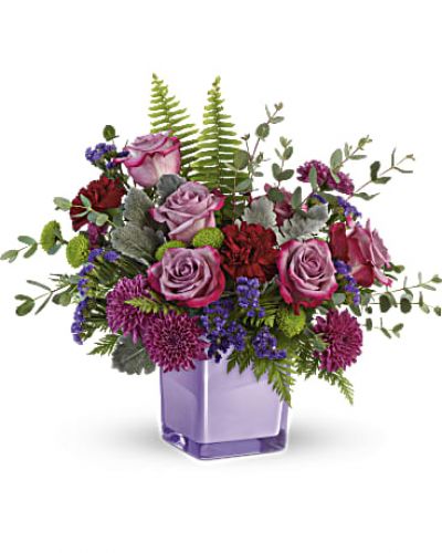 <div id="mark-3" class="m-pdp-tabs-marketing-description">A serene style statement in lush lavender roses and fresh maroon blooms, this rich bouquet in an amethyst-colored cube is a beautiful surprise for any occasion!</div>
<div id="desc-3">
<ul>
<li>
<blockquote>Lavender roses, maroon carnations, purple cushion spray chrysanthemums, green button spray chrysanthemums, and purple sinuata statice are accented with sword fern, leatherleaf fern, dusty miller, and parvifolia eucalyptus.</blockquote>
</li>
</ul>
</div>
