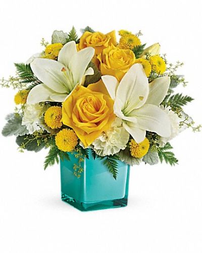 <div class="m-pdp-tabs-description">
<div id="mark-1" class="m-pdp-tabs-marketing-description">
Inspired by the sunny sound of children's laughter, this lighthearted bouquet of golden roses and fragrant white lilies is presented in a stunning cube vase. What a stylish way to make someone smile!
</div>
</div>
This cheerful bouquet features yellow roses, white asiatic lilies, white carnations, yellow button spray chrysanthemums, seeded eucalyptus, dusty miller and leatherleaf fern. Delivered in a glass cube.